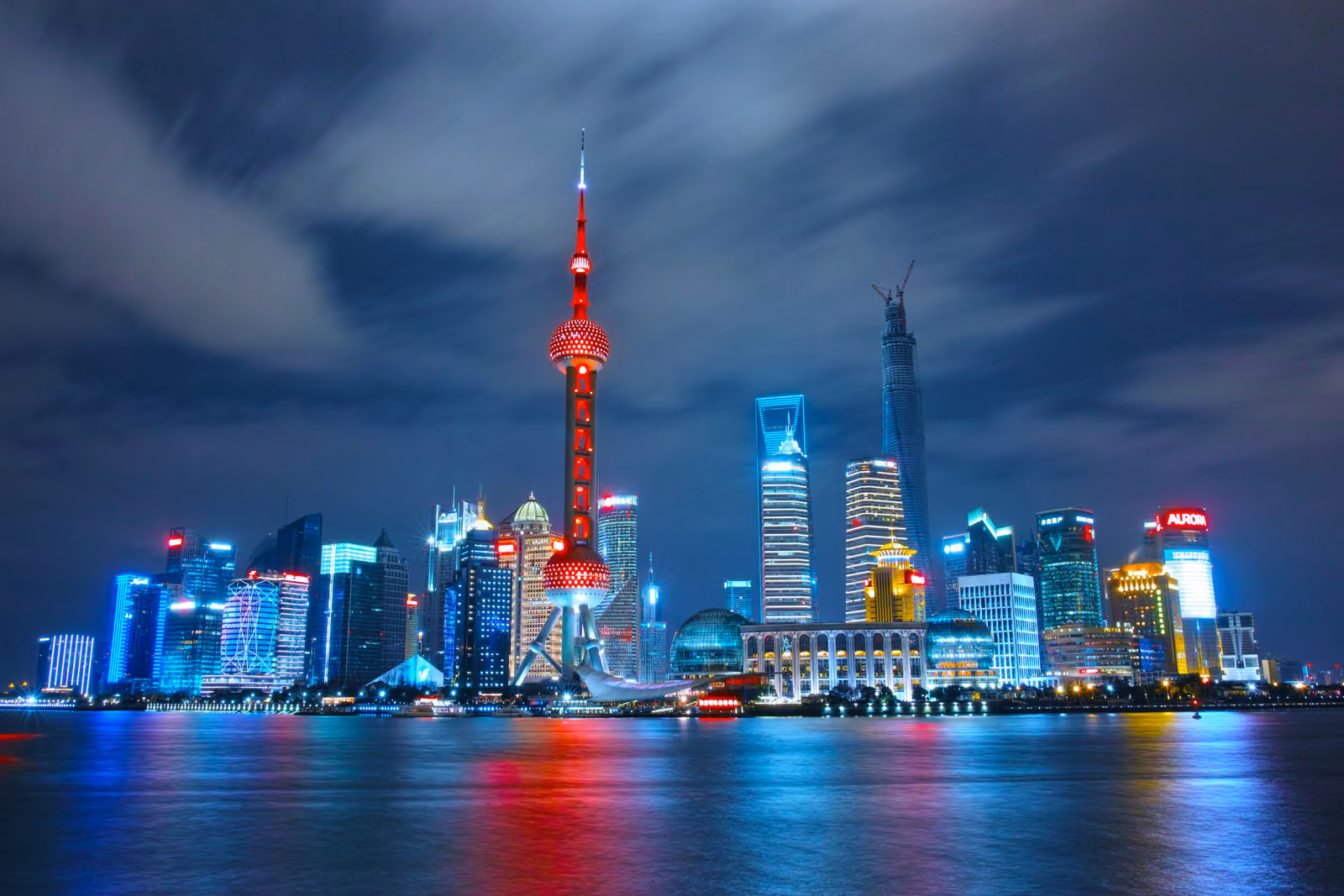 Shanghai skyline beside the Huangpu River at dusk